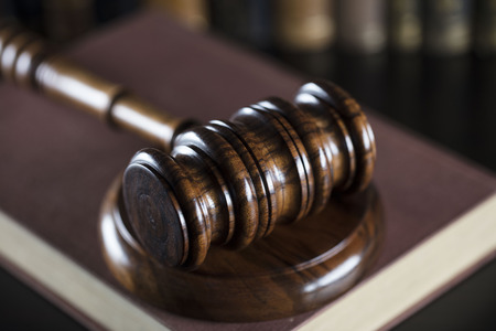 Court library - gavel of the judge  and books.