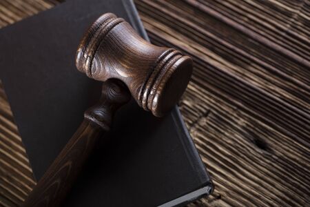 Business and law theme. Gavel and code of corporation law.