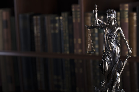 Court library â statue  of justice and books.の写真素材