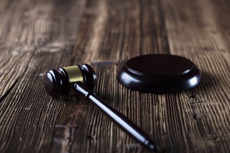 Auction and business concept.  Gavel  on the wooden background.の写真素材