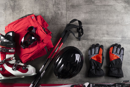 Winter sport theme. Ski equipment on gray tiles. Place for typography. Top view.の写真素材