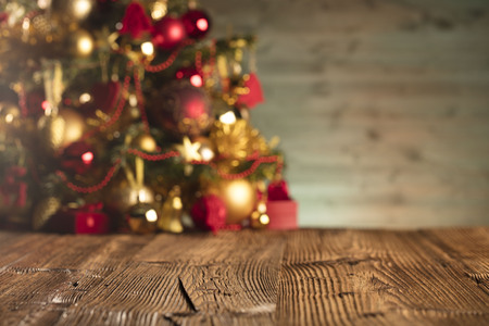 Christmas decoration and gifts on a rustic wooden background.の写真素材