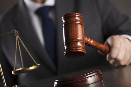 Judge with the gavel in his hand. Law and justice theme.の写真素材
