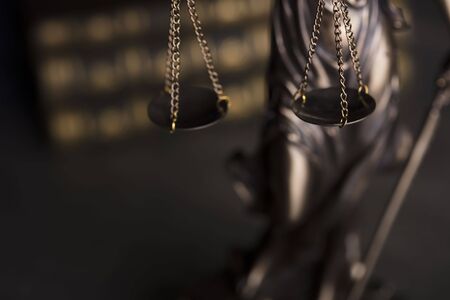 Law code. Statue of justice, books. Place for typography.の写真素材