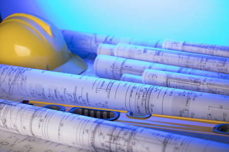 Architecture concept. Blueprints and helmet of constructor. Place for text.の写真素材