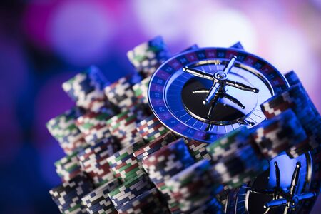 Casino. High contrast image of casino roulette. Poker chips. Bokeh background.の写真素材