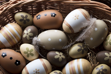 Happy Easter background. Presents and decorations. Easter eggs in basket.
