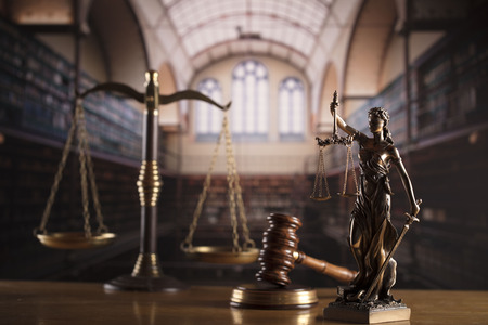 Law and justice theme â court library. Gavel, scale and Themis statue.の写真素材