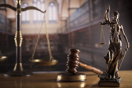 Law and justice theme â court library. Gavel, scale and Themis statue.の写真素材