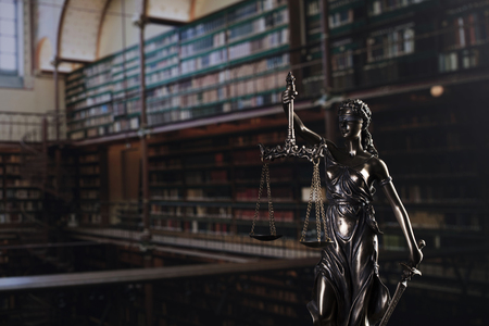 Court library â statue  of justice and books.の写真素材