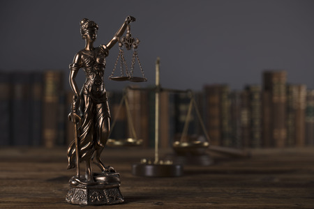 Themis - symbol of the blind justice on dark background.の写真素材