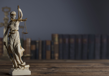 Themis - symbol of the blind justice on gray background.の写真素材