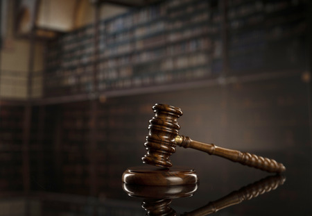 Gavel. Auction and business concept.  Gavel in the lawyer library.の写真素材