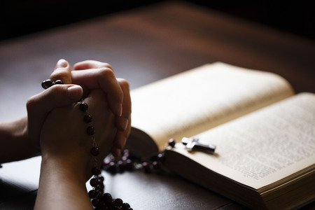Religion concept background. Christianity. Holy Bible and rosary. Prayer symbols.の写真素材