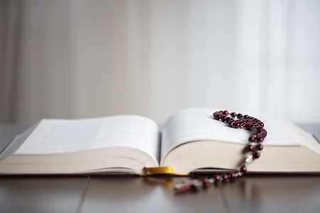 Religion concept background. Christianity. Holy Bible and rosary.の写真素材