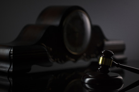 The law concept background.  Gavel of  the judge on the gray background.の写真素材