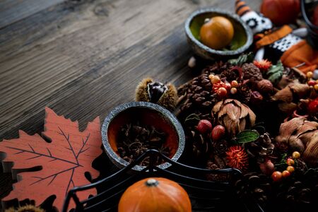 Halloween theme. Decorations prepared for Halloween on the rustic wooden table. Place for text.の写真素材