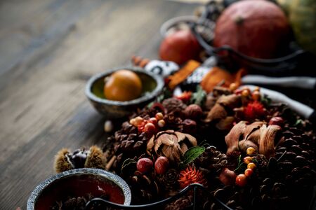 Halloween theme. Decorations prepared for Halloween on the rustic wooden table. Place for text.の写真素材