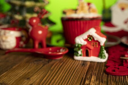 Christmas background. Christmas tableware and decorations on rustic wooden table.の写真素材