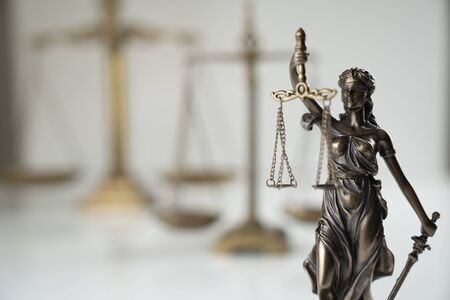Law symbol composition.  Themis statue and scale of justice on off-white background.の写真素材