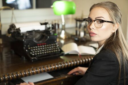 Young female lawyer during work in chamber.の写真素材