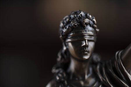 Justice concept. Themis statue in jugde office.の写真素材