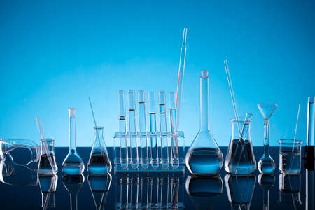 Science concept. Laboratory equipment composition. Test tubes on blue background.の写真素材