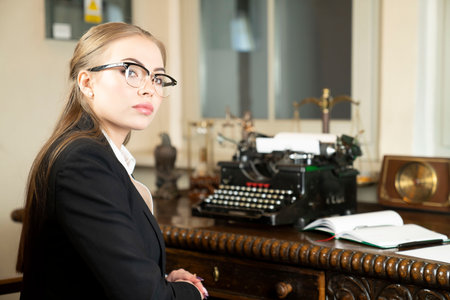 Young female lawyer during work in chamber.の写真素材