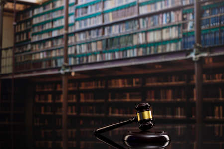 Law theme. Court library - gavel of the judge, scale and books.の写真素材