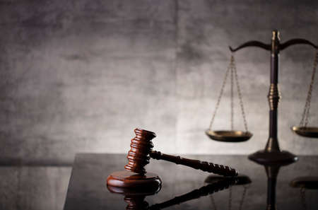 Law and justice concept. Law symbols composition: judgeâ€™s gavel, Themis  statue and scale....
