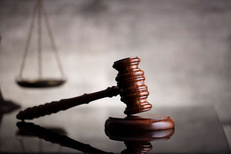 Law and justice concept. Law symbols composition: judgeâ€™s gavel, Themis  statue and scale....