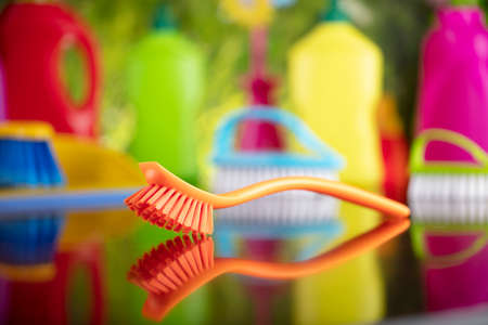 Spring house and office cleaning. Cleaning kit and sources on the glass table. Bokeh  background.の写真素材