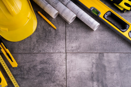 Contractor Yellow Contractor theme. Tool kit of the contractor: yellow hardhat, libella ...