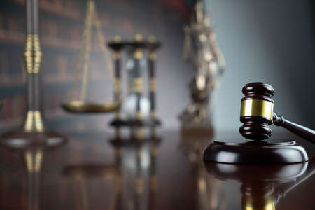 Law theme. Court library - gavel of the judge, scale and legal books.の写真素材