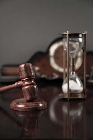 Law concept. Law symbols composition: judgeâ€™s gavel and scale. Gray background.