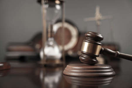 Law concept. Law symbols composition: judgeâ€™s gavel and scale. Gray background.