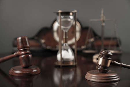 Law concept. Law symbols composition: judgeâ€™s gavel and scale. Gray background.