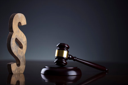 Gavel. Auction sale and business concept.  Gavel and commercial code on the dark gray  background.