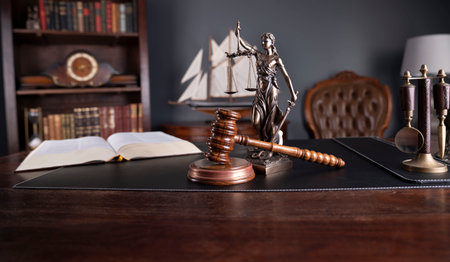 Law theme - judge office. Gavel, legal books and Themis  on the judge desk.の写真素材