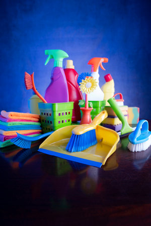 Variety of cleaning products on a dark background. Selective focus.の写真素材
