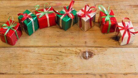 Christmas gift box on wood background for Christmas and New year.の写真素材