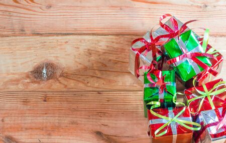 Christmas gift box on wood background for Christmas and New year.の写真素材