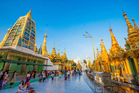 YANGON,MYANMAR-MARCH 15.2017: Buddhist Pilgrims in the Shwedagon Pagoda at night. It is the most sacred Buddhist pagoda for the Burmese.のeditorial素材