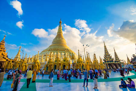 YANGON,MYANMAR-MARCH 15.2017: Buddhist Pilgrims in the Shwedagon Pagoda at night. It is the most sacred Buddhist pagoda for the Burmese.のeditorial素材