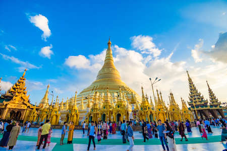 YANGON,MYANMAR-MARCH 15.2017: Buddhist Pilgrims in the Shwedagon Pagoda at night. It is the most sacred Buddhist pagoda for the Burmese.のeditorial素材