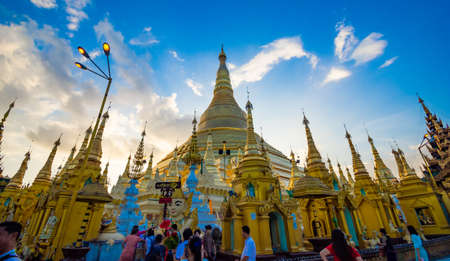 YANGON,MYANMAR-MARCH 15.2017: Buddhist Pilgrims in the Shwedagon Pagoda at night. It is the most sacred Buddhist pagoda for the Burmese.のeditorial素材