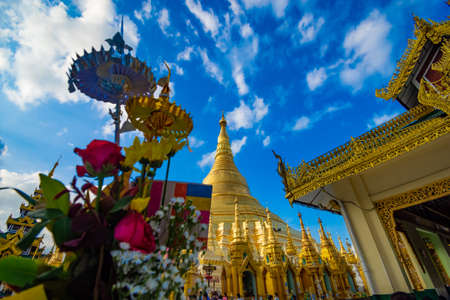 YANGON,MYANMAR-MARCH 15.2017: Buddhist Pilgrims in the Shwedagon Pagoda at night. It is the most sacred Buddhist pagoda for the Burmese.のeditorial素材
