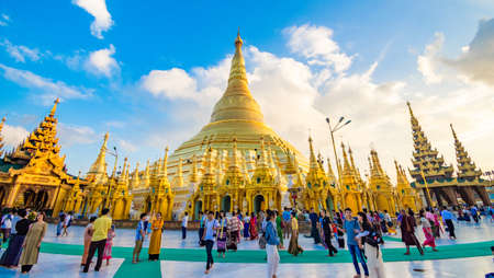 YANGON,MYANMAR-MARCH 15.2017: Buddhist Pilgrims in the Shwedagon Pagoda at night. It is the most sacred Buddhist pagoda for the Burmese.のeditorial素材