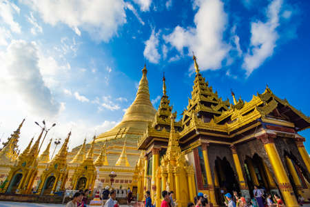 YANGON,MYANMAR-MARCH 15.2017: Buddhist Pilgrims in the Shwedagon Pagoda at night. It is the most sacred Buddhist pagoda for the Burmese.のeditorial素材