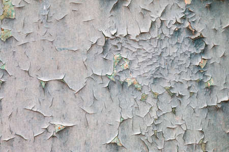 cracked paint on the wall